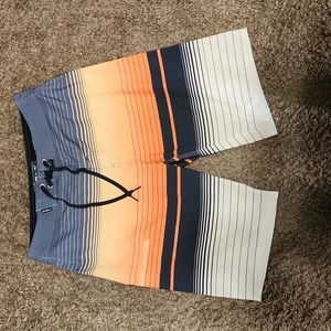 Size 29 swim shorts. Unlined